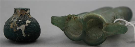 Two Roman green glass vessels, c.2nd century AD, 12cm